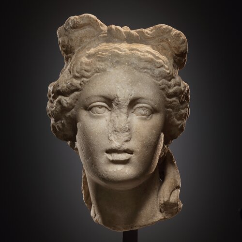 A Head of a Youthful Deity with Krobylos