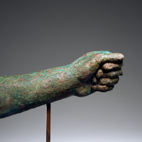 A Left Lower Arm of a Bronze Statuette